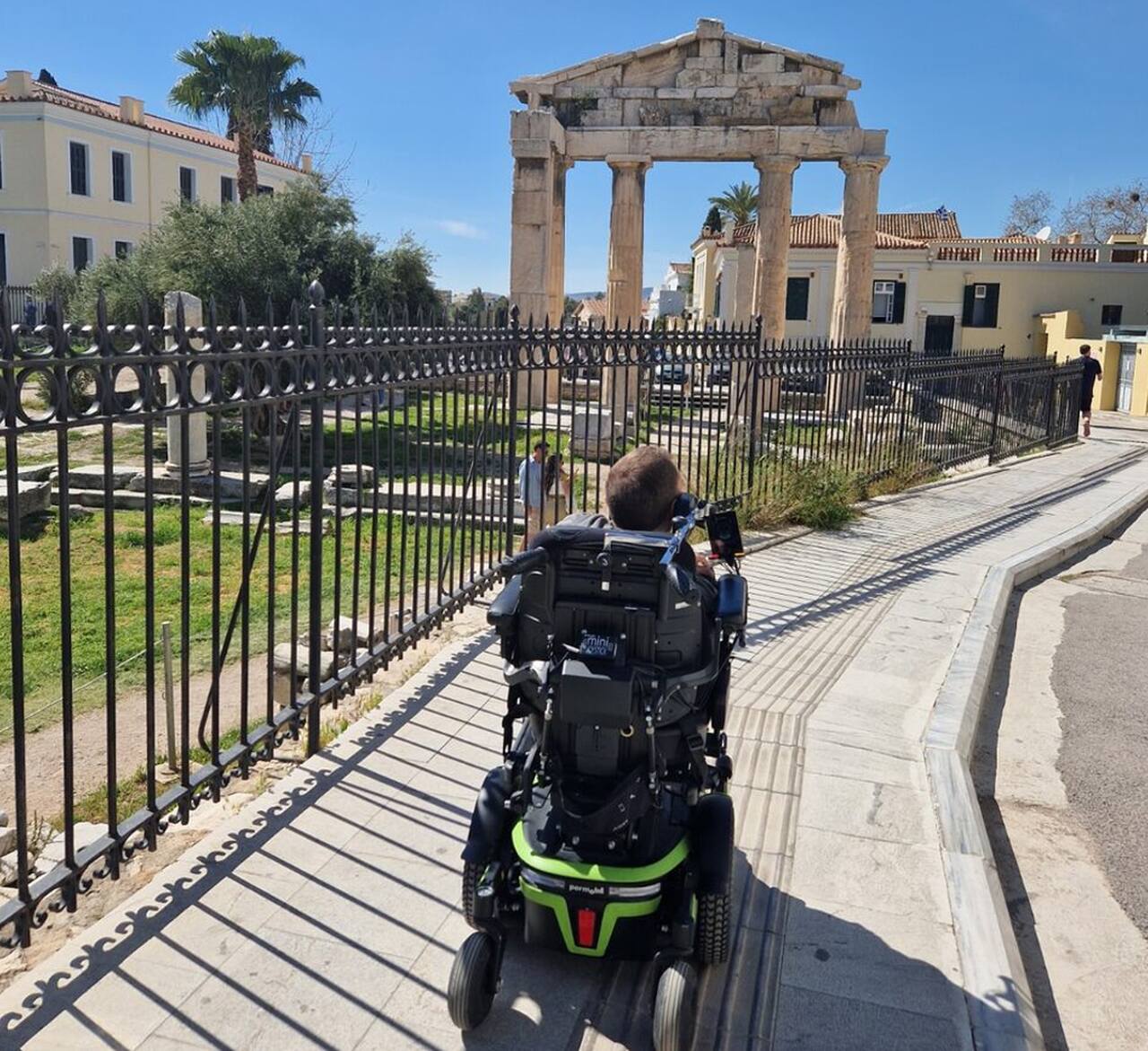 Rolling on an accessible sidewalk in Athens